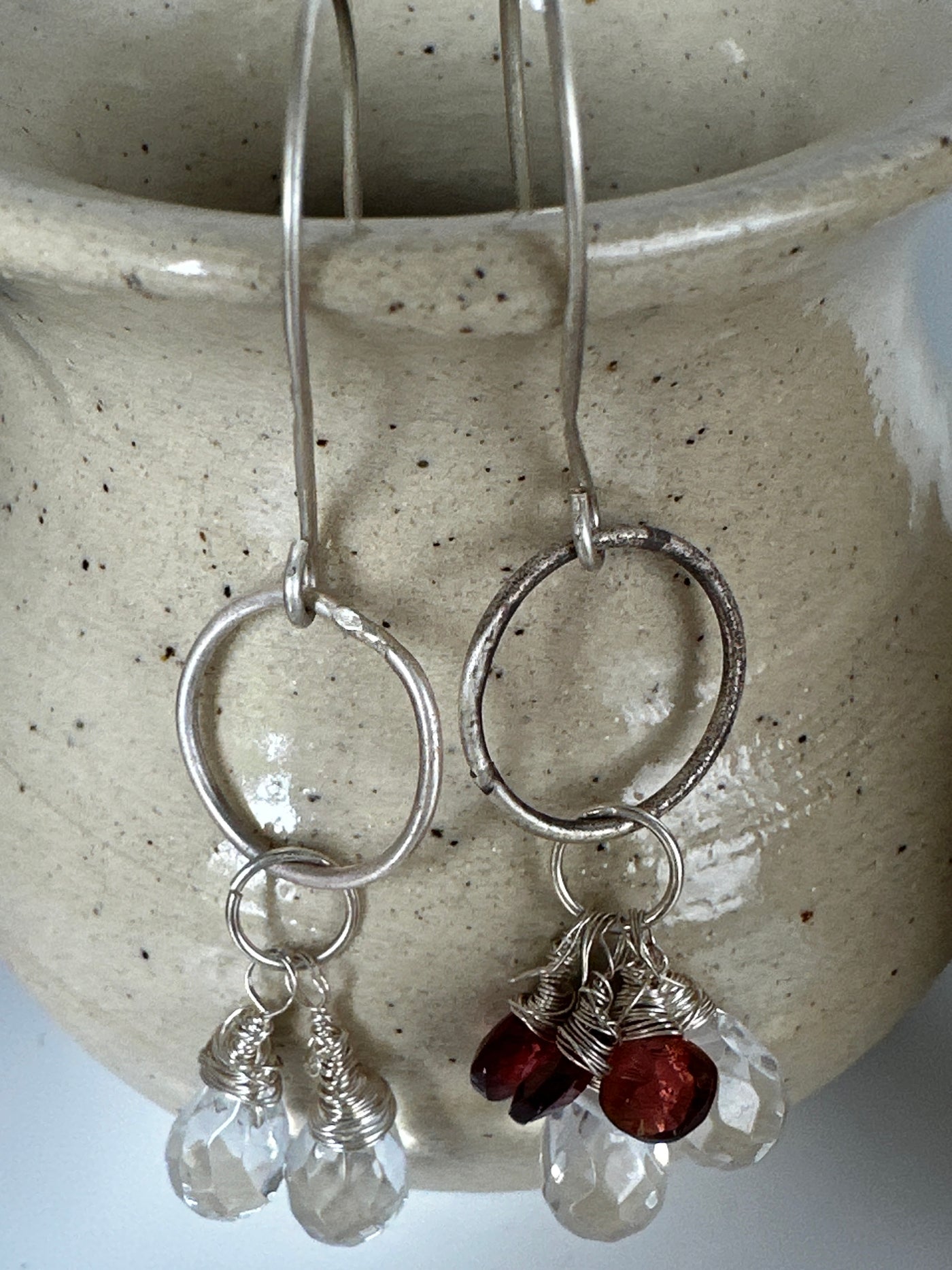 A-symmetric silver earrings with pear shaped crystals