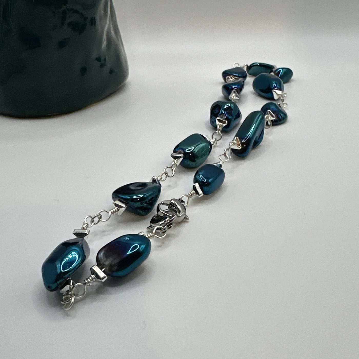 Rock crystal blue and triangular elements necklace