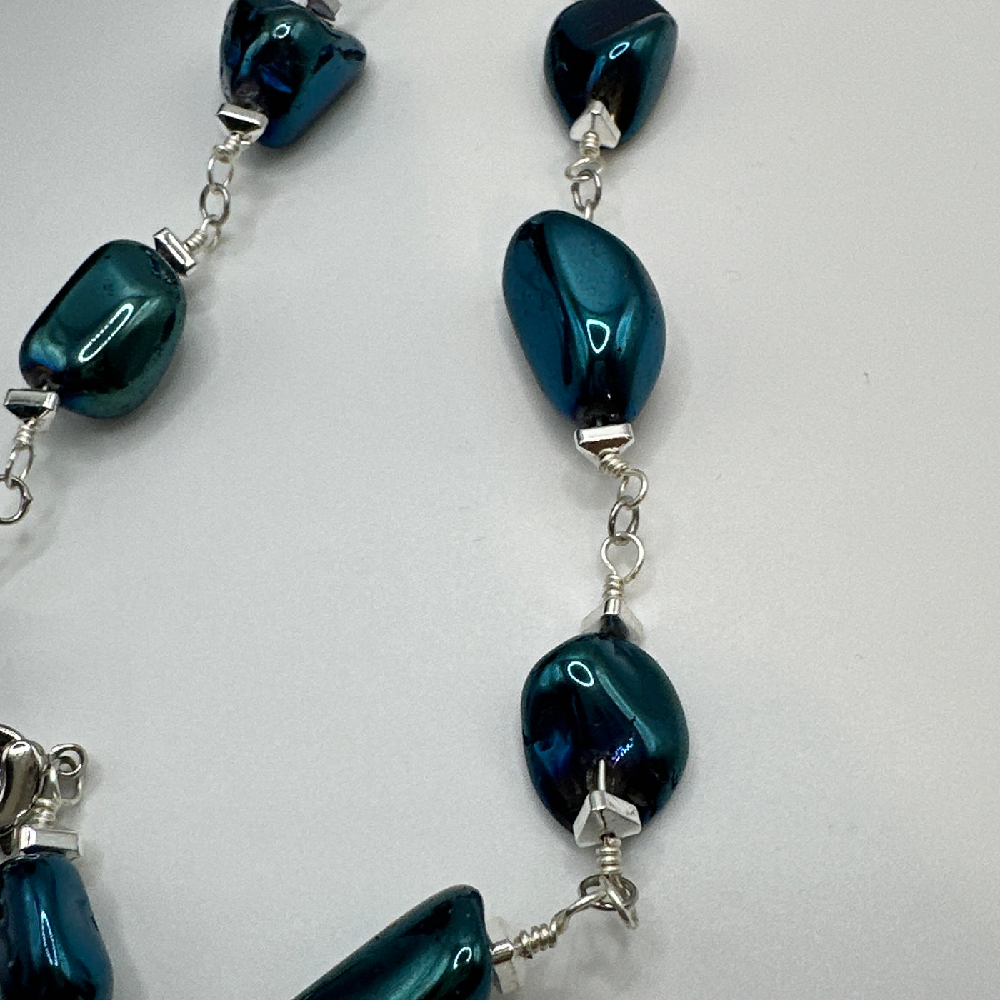 Rock crystal blue and triangular elements necklace