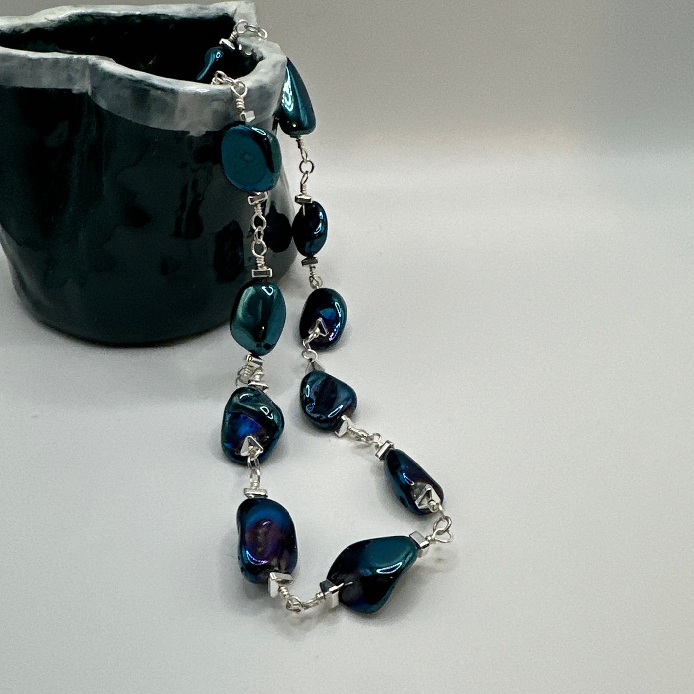 Rock crystal blue and triangular elements necklace