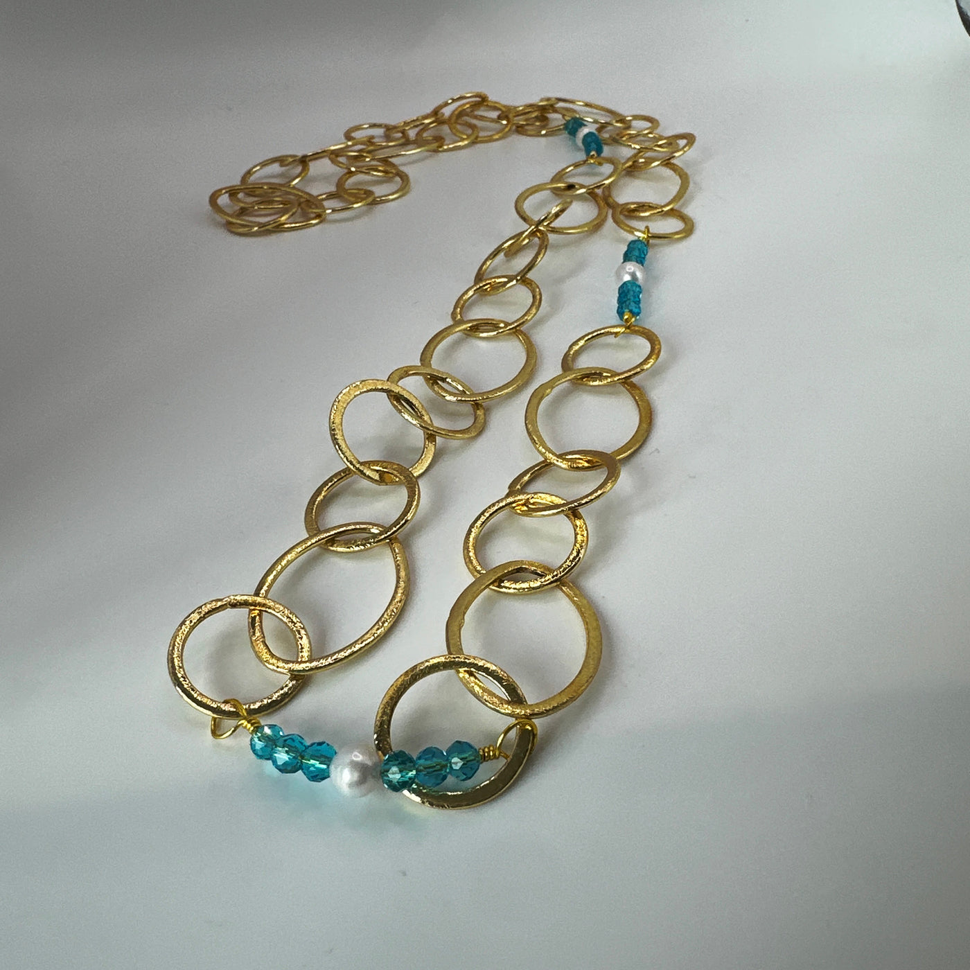 Brass ovals and round with tourquoise crystal rondelles and pearls long necklace