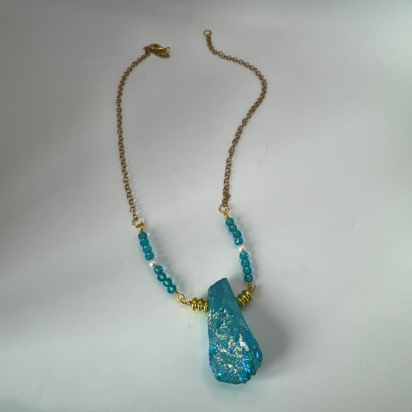 Forzatina steel gold washed necklace with round brass, crystals rocks brilliant tourquoise and pearls elements