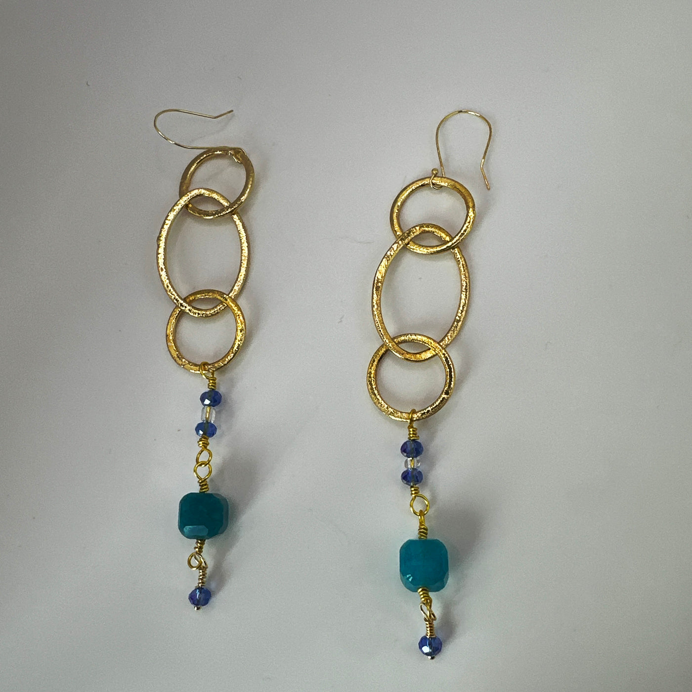 Brass round and ovals with crystal rondelles and blue square beads long earrings