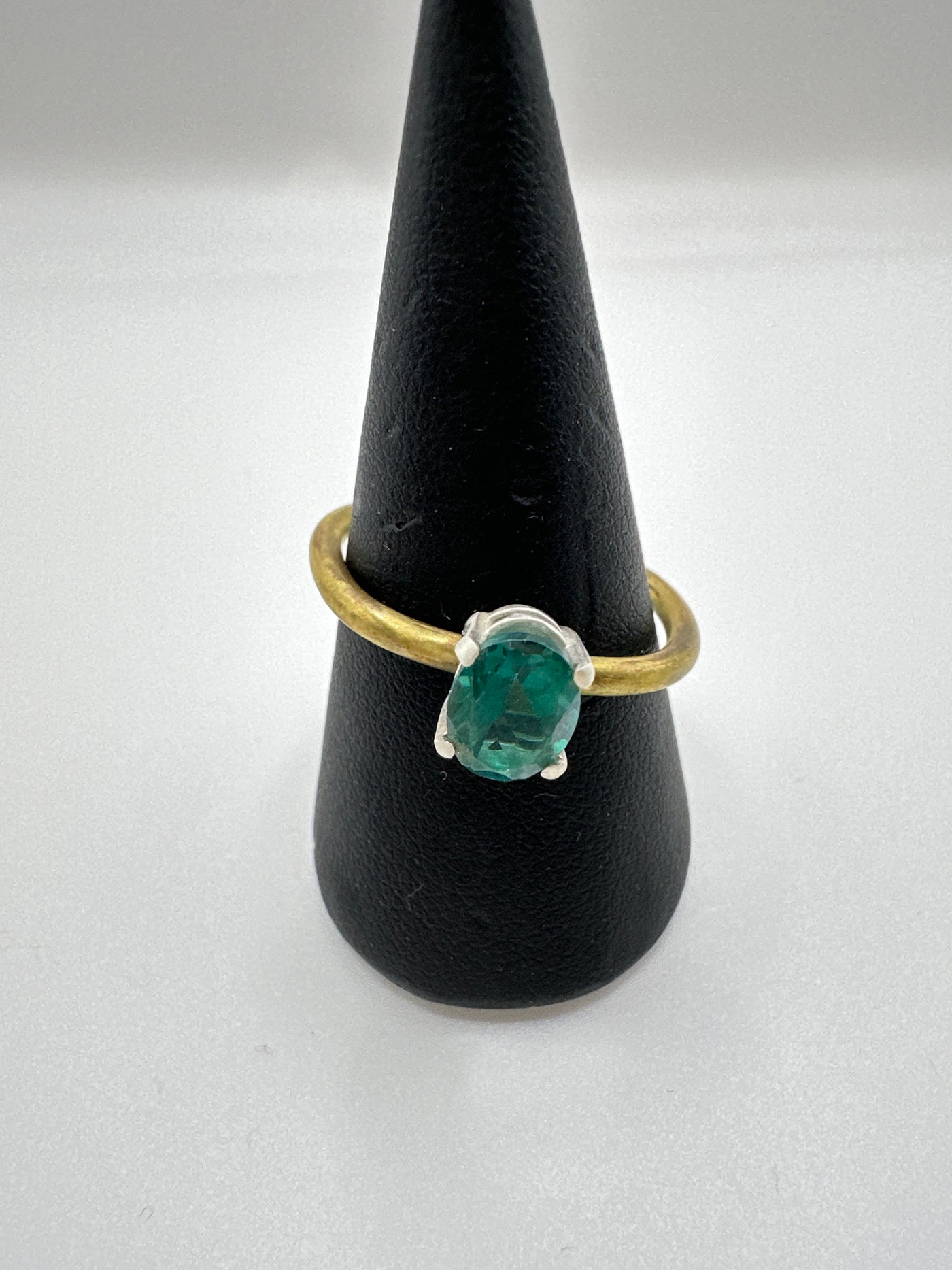 Enhanced teal topaz (8*6 oval) in silver cast and brass square ring