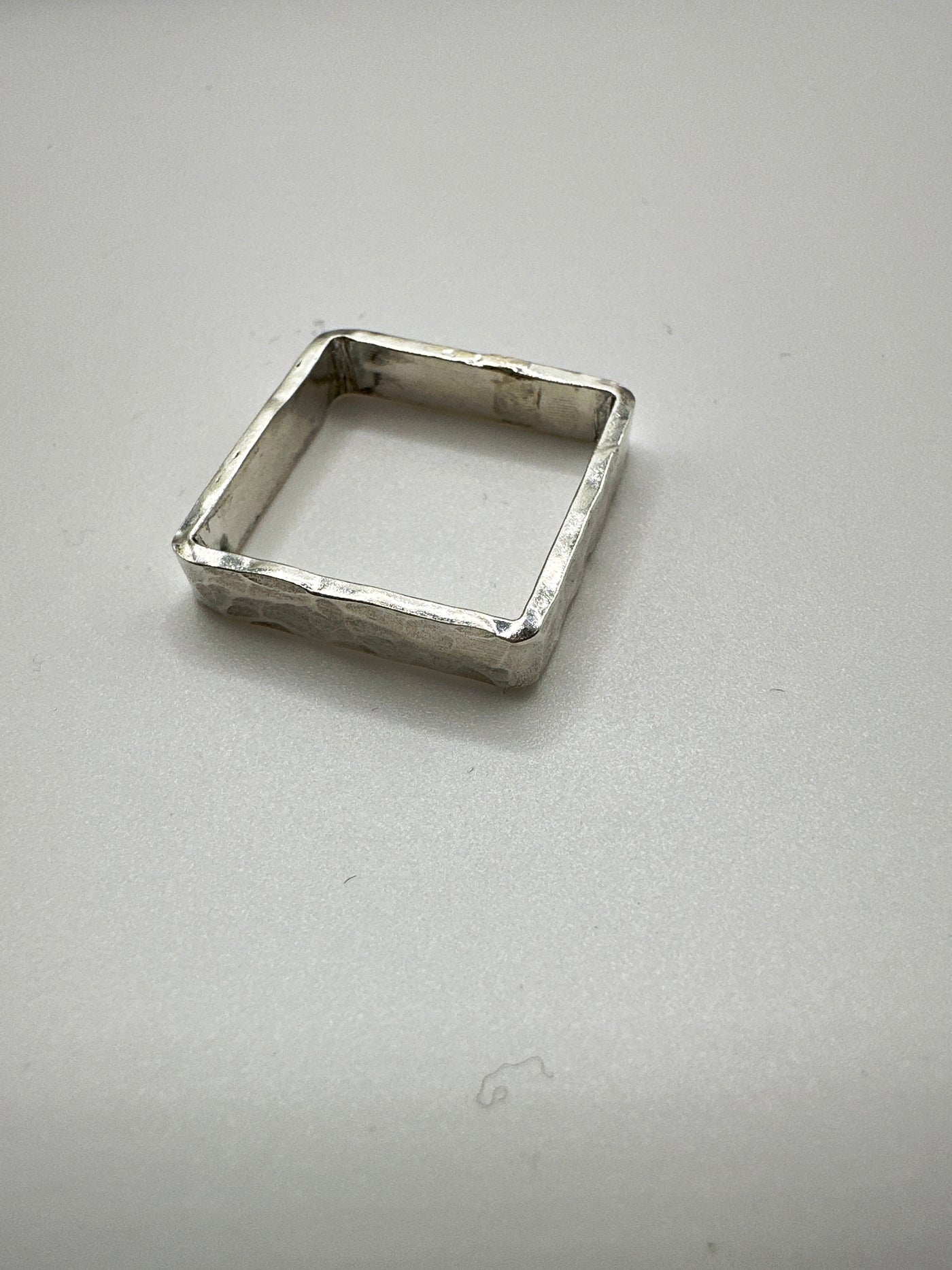 Silver square hammered ring. Size N