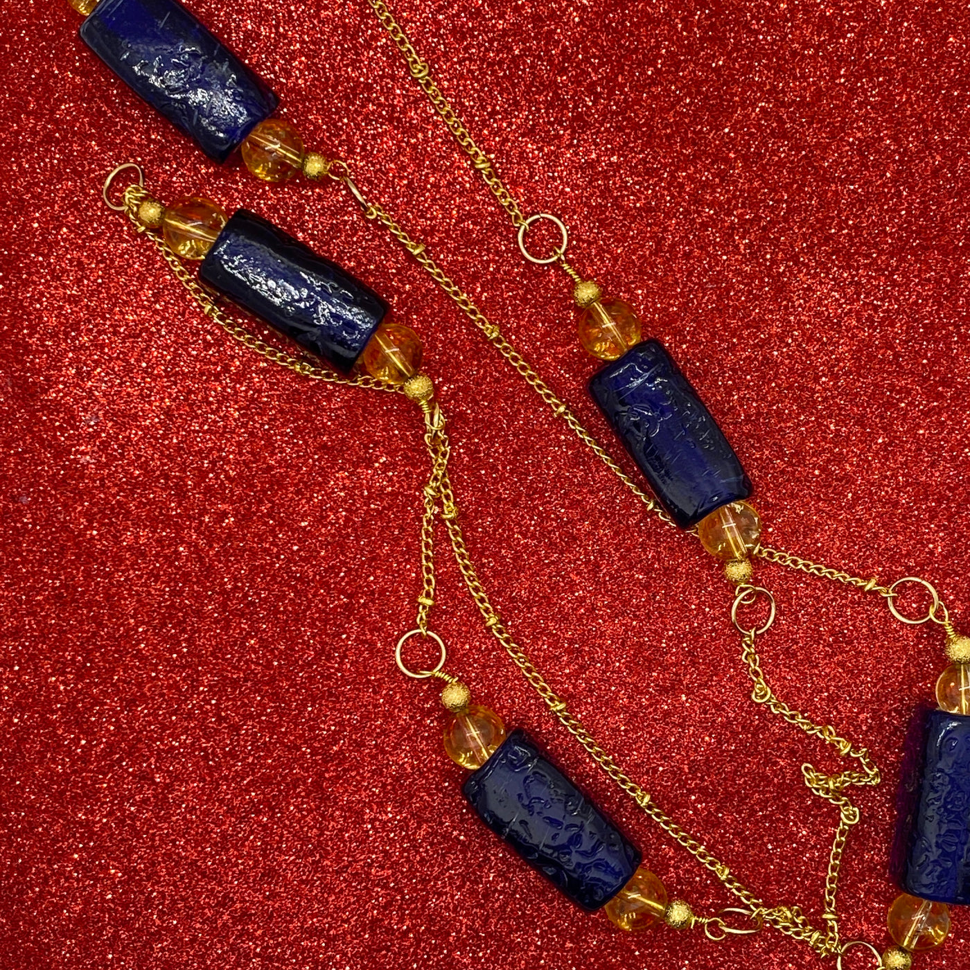 Dark blue glass tubes and citrine brass necklace