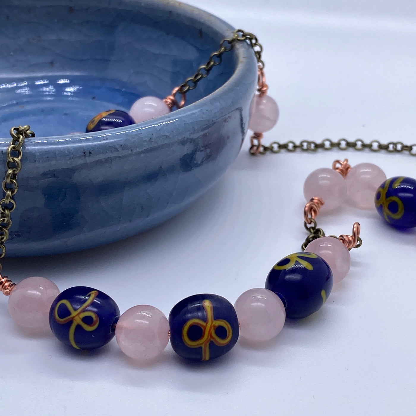 Hand inlaid/Wound Java glass and rose quartz on chain necklace