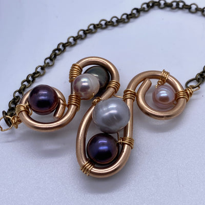 Bronze wire and freshwater pendant line