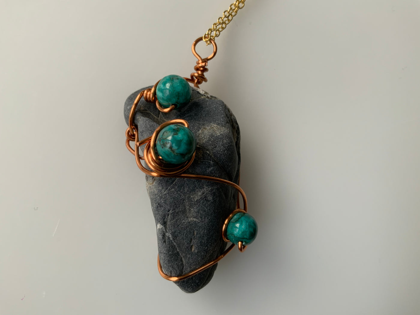 Grey natural stone with african tourquoise and wire pendant