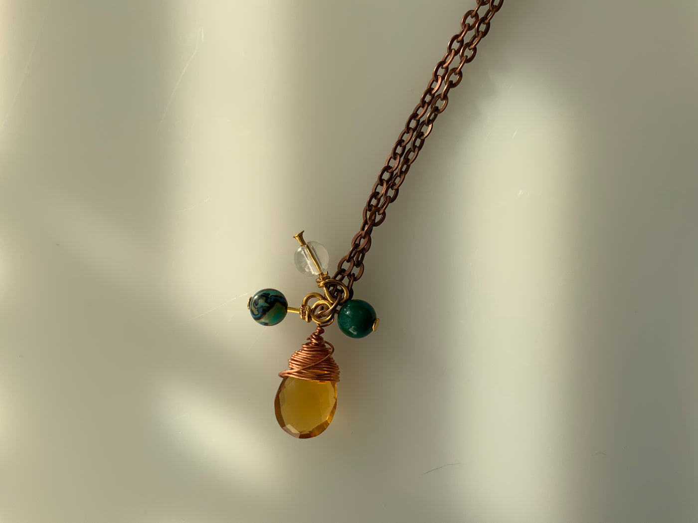 Citrine briolette, quartz, blue and green malachite, wire and chain pendant