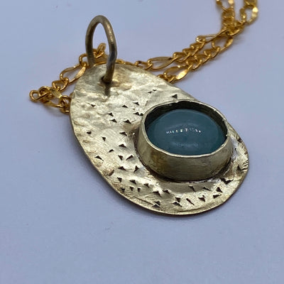 Brass pendants with cabochon stone