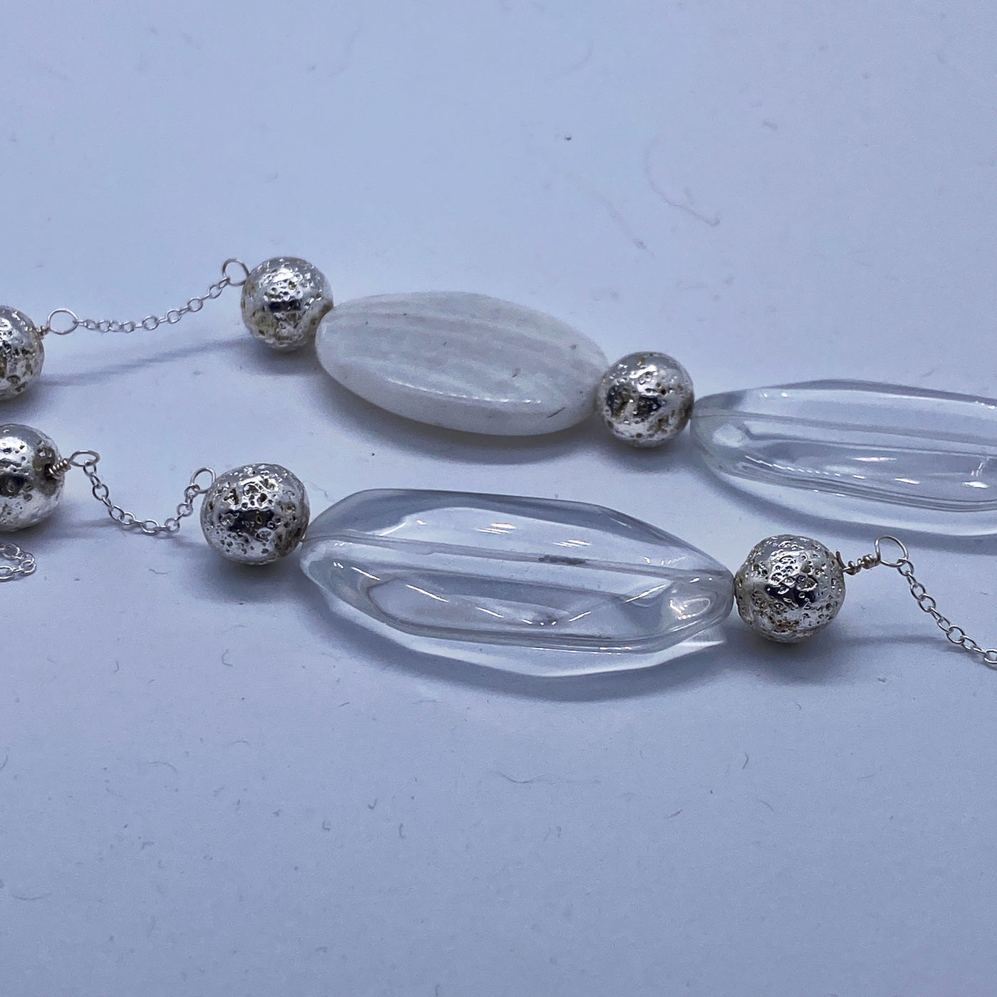 Transparent and white glass necklace