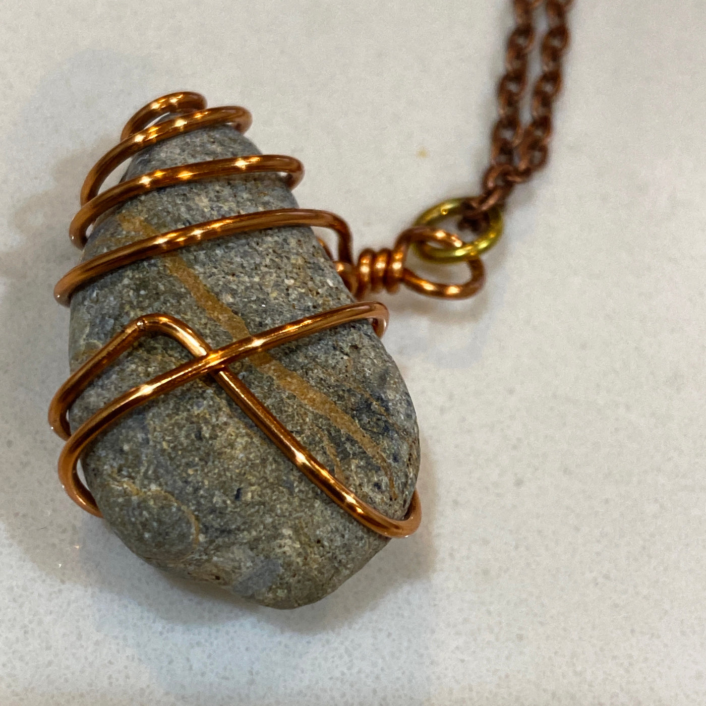Grey natural stone on wire. Small pendant. This stone has a natural gorgeous yellow line.