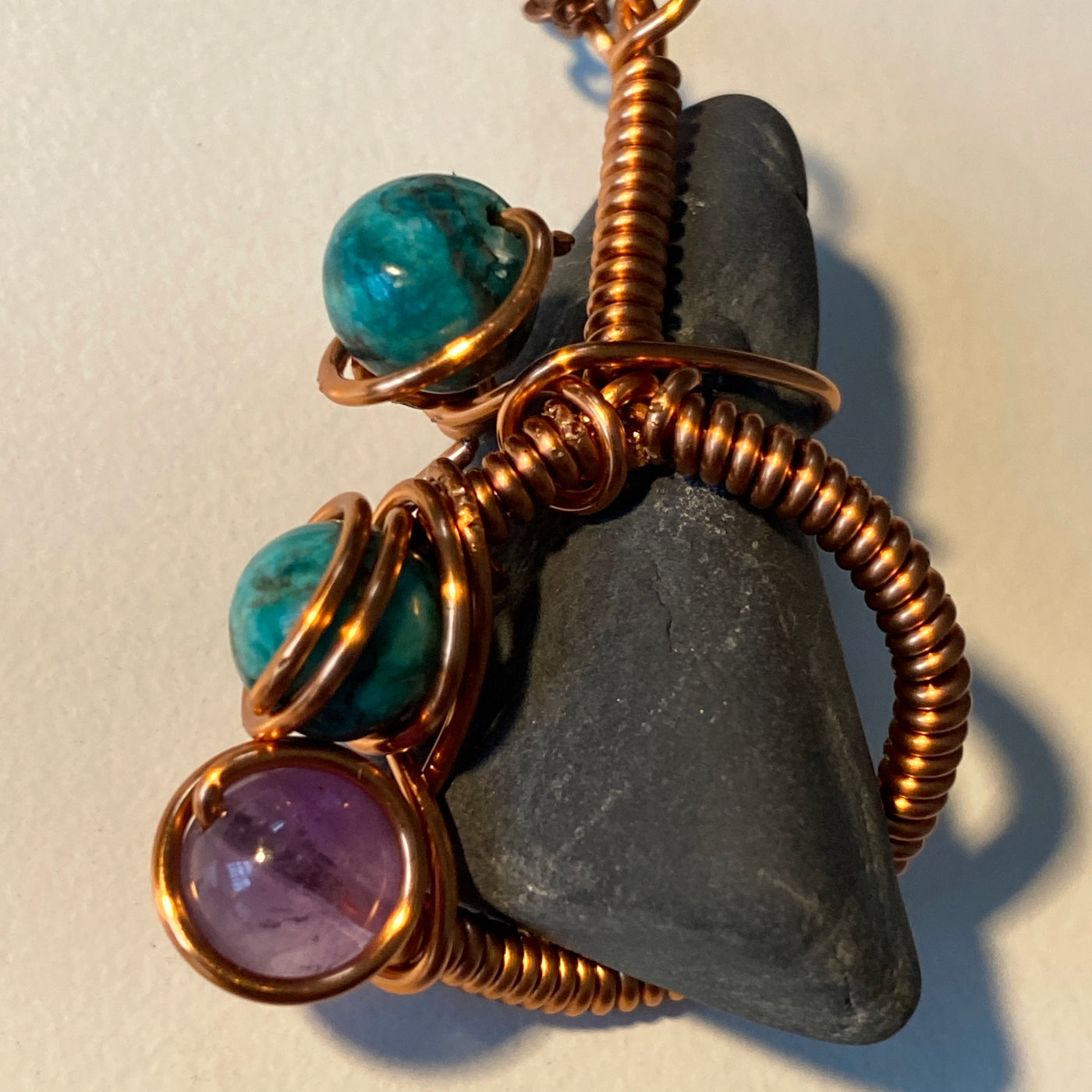 Black stone, turquoise, amethyst and wire