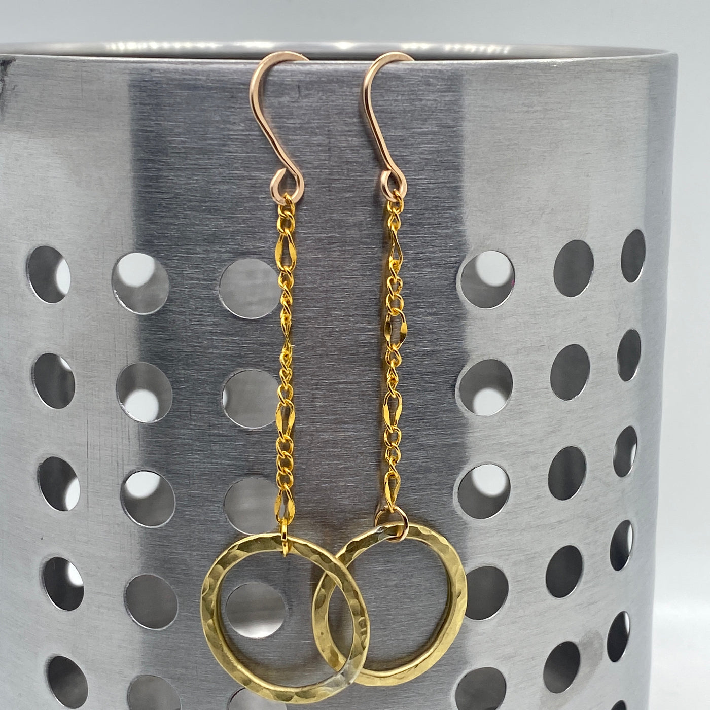 Brass circle texturized earrings on chain