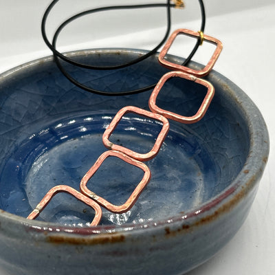 Copper squares long pendant (10 cm) on cord 1.5 mm leather black with gold filled clasp 16 ''