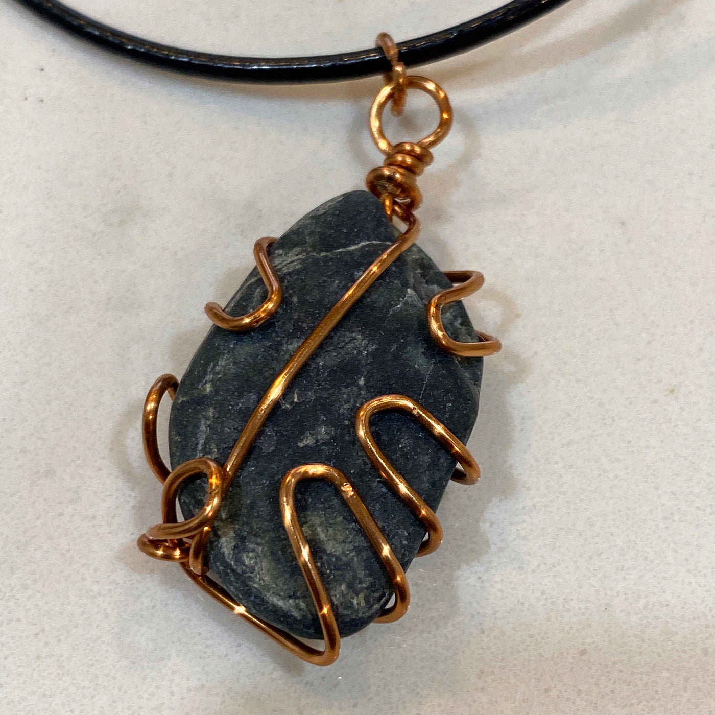 Black stone and wire. Small pendant.