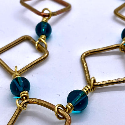 Handmade brass squares with ocean blue round glass-  necklace