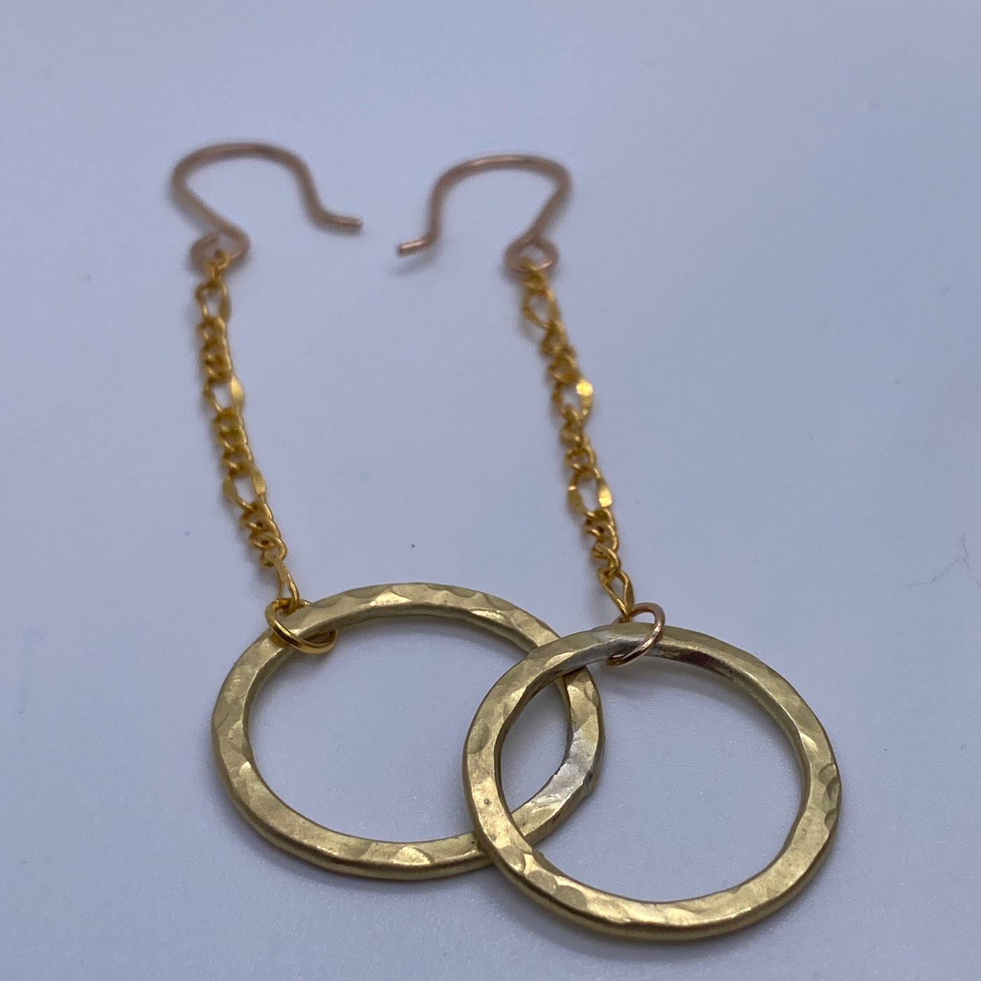 Brass circle texturized earrings on chain