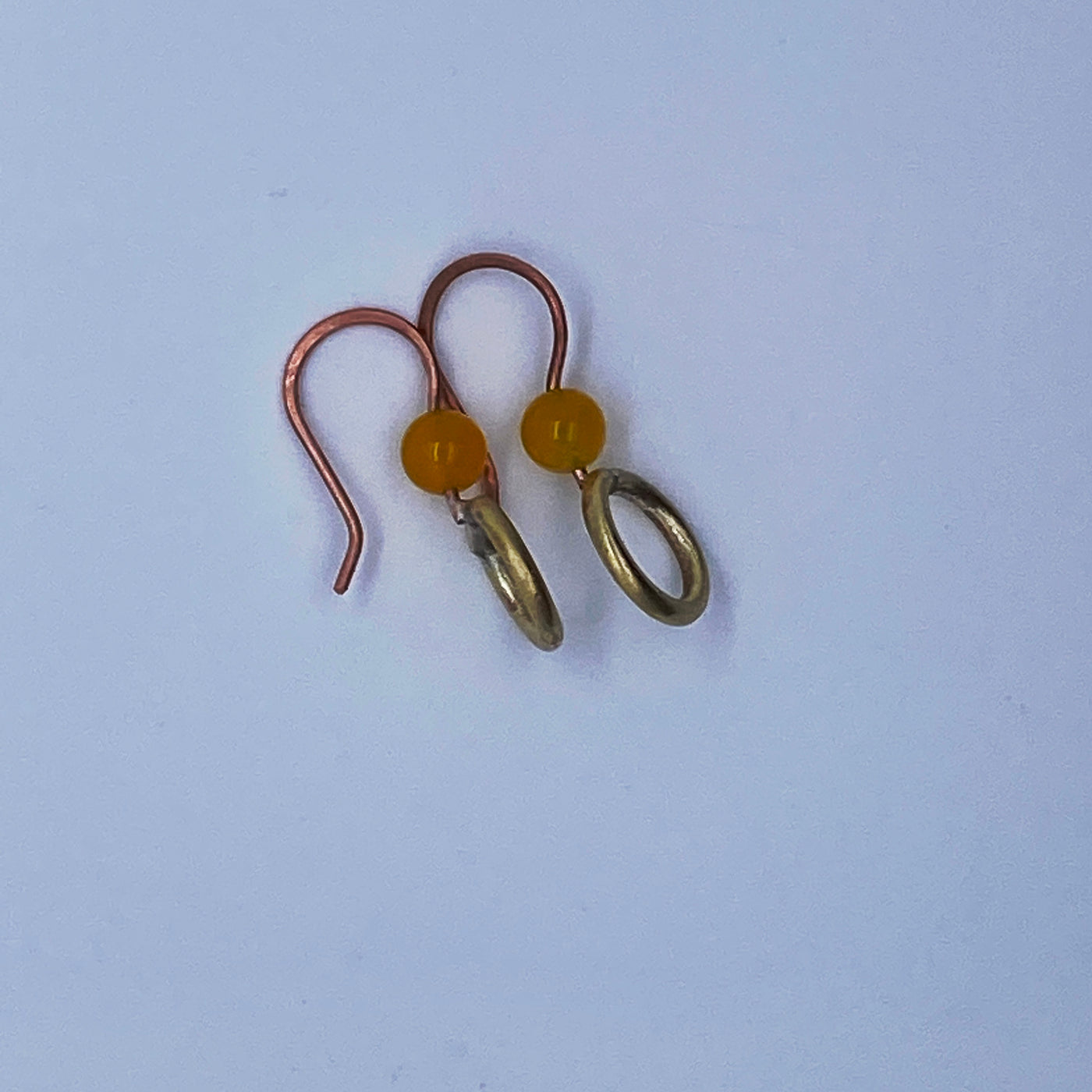 Silver and wire earrings with yellow agate.