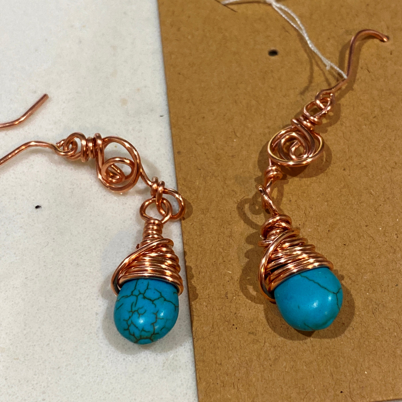 Copper and copper wrapped blue holwlite briolette earings