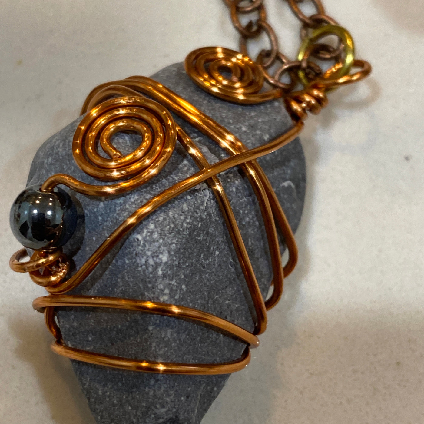 Grey natural stone, black stone and wire. Medium stone pendant.