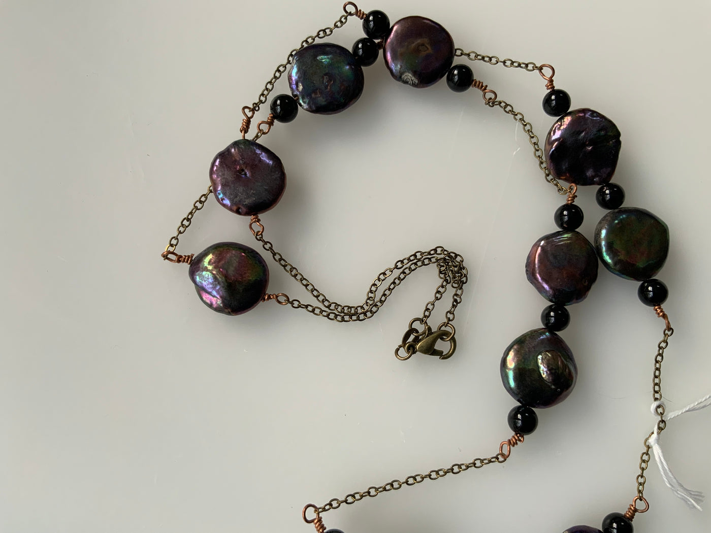 Round flat pearls and onyx necklace