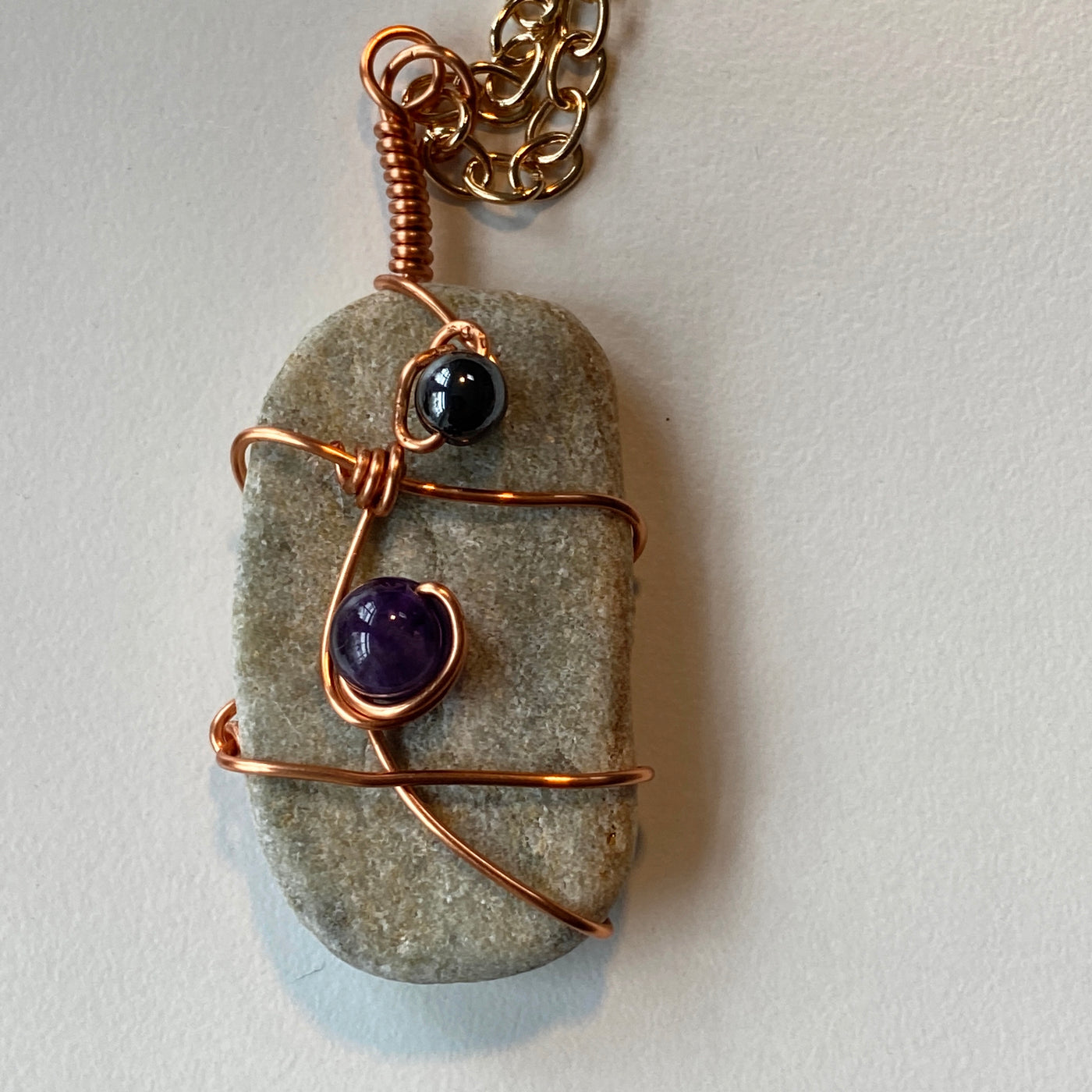 White natural stone, amethist and wire pendant