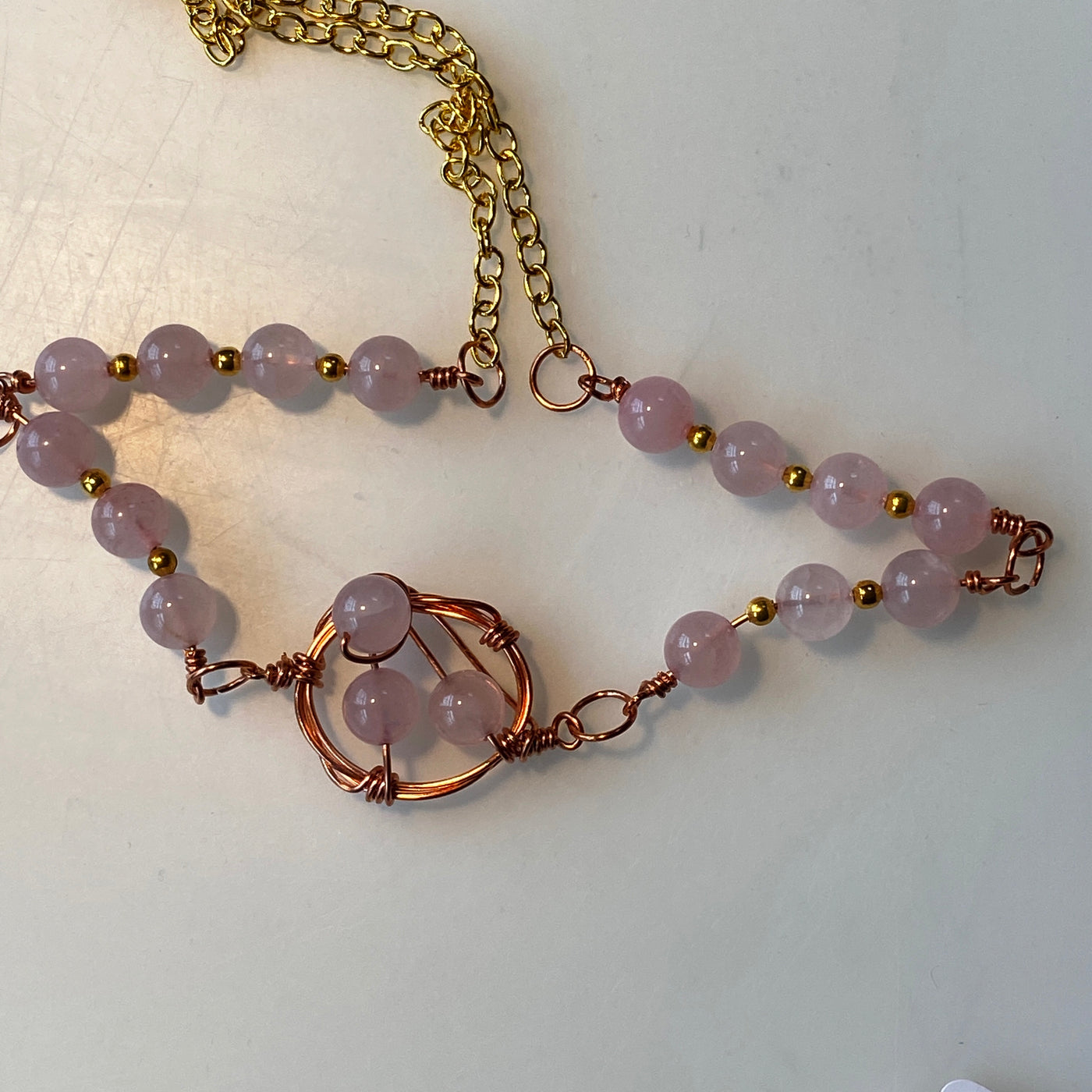 Rose quartz and wire twisted lines necklace