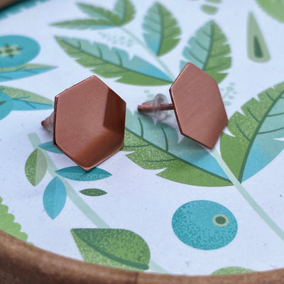 Copper hexagon earrings with silver post 