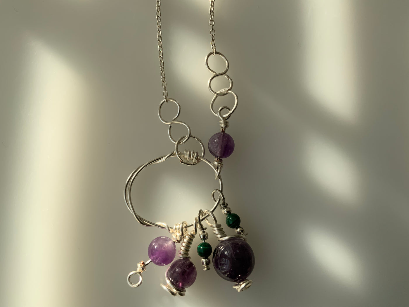 Pendant - Amethyst and  malachite on silver wire and chain for Shake and move collection.