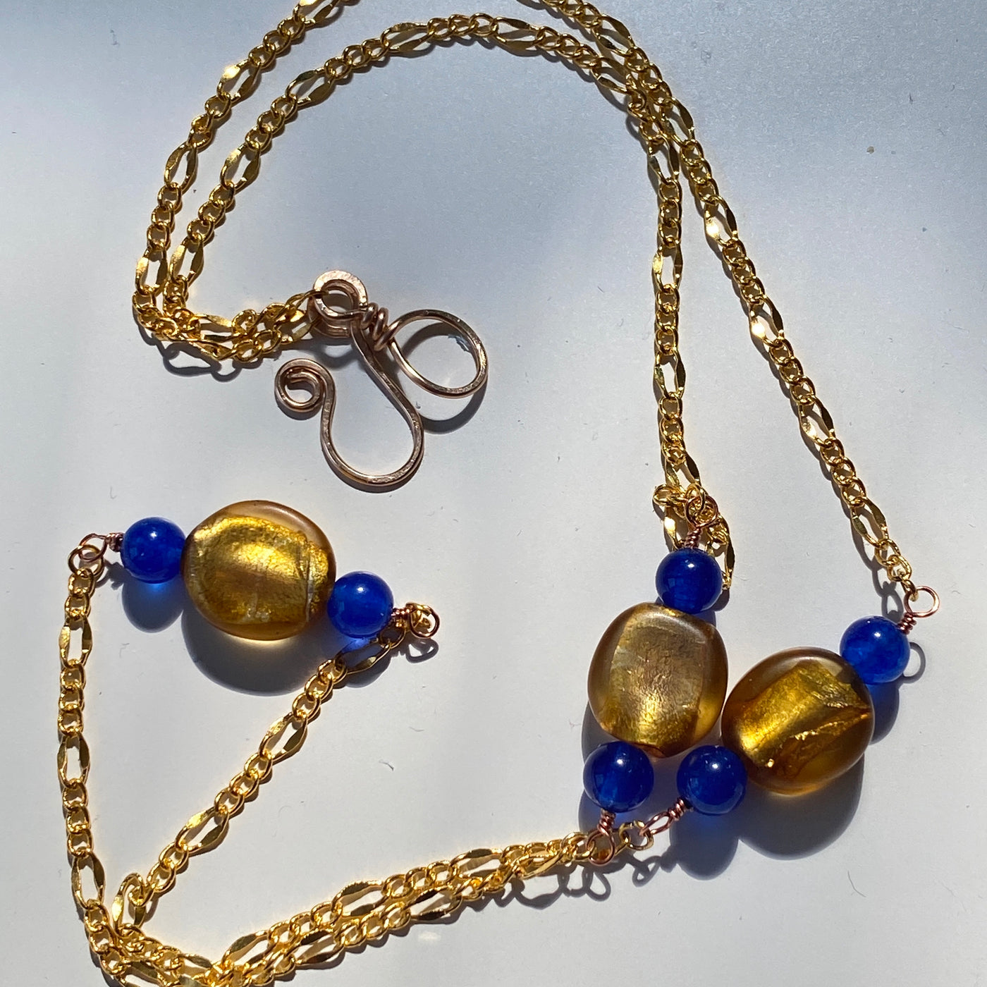 Golden glass beads and blue calchedony necklace. 