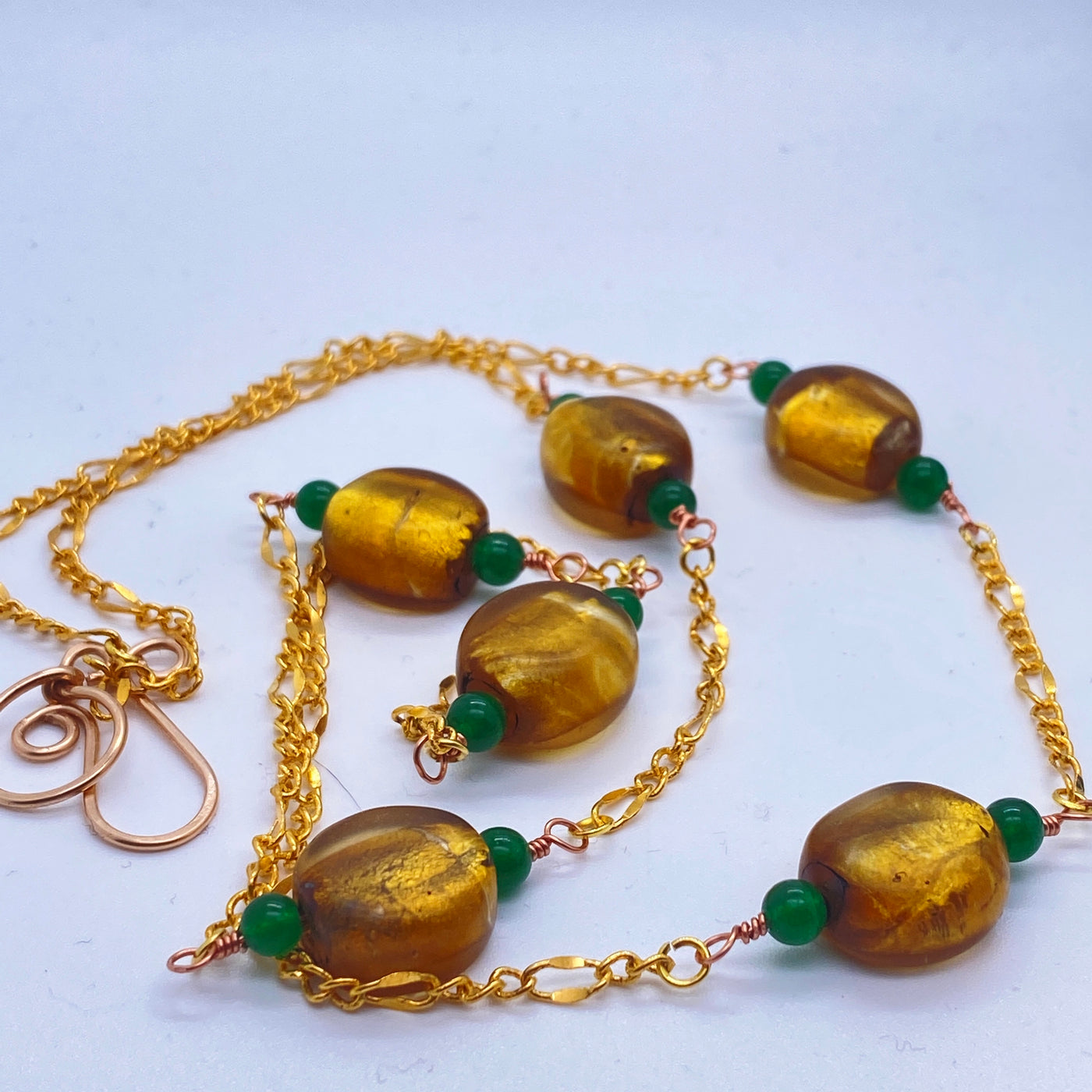 Golden glass beads and green calchedony necklace