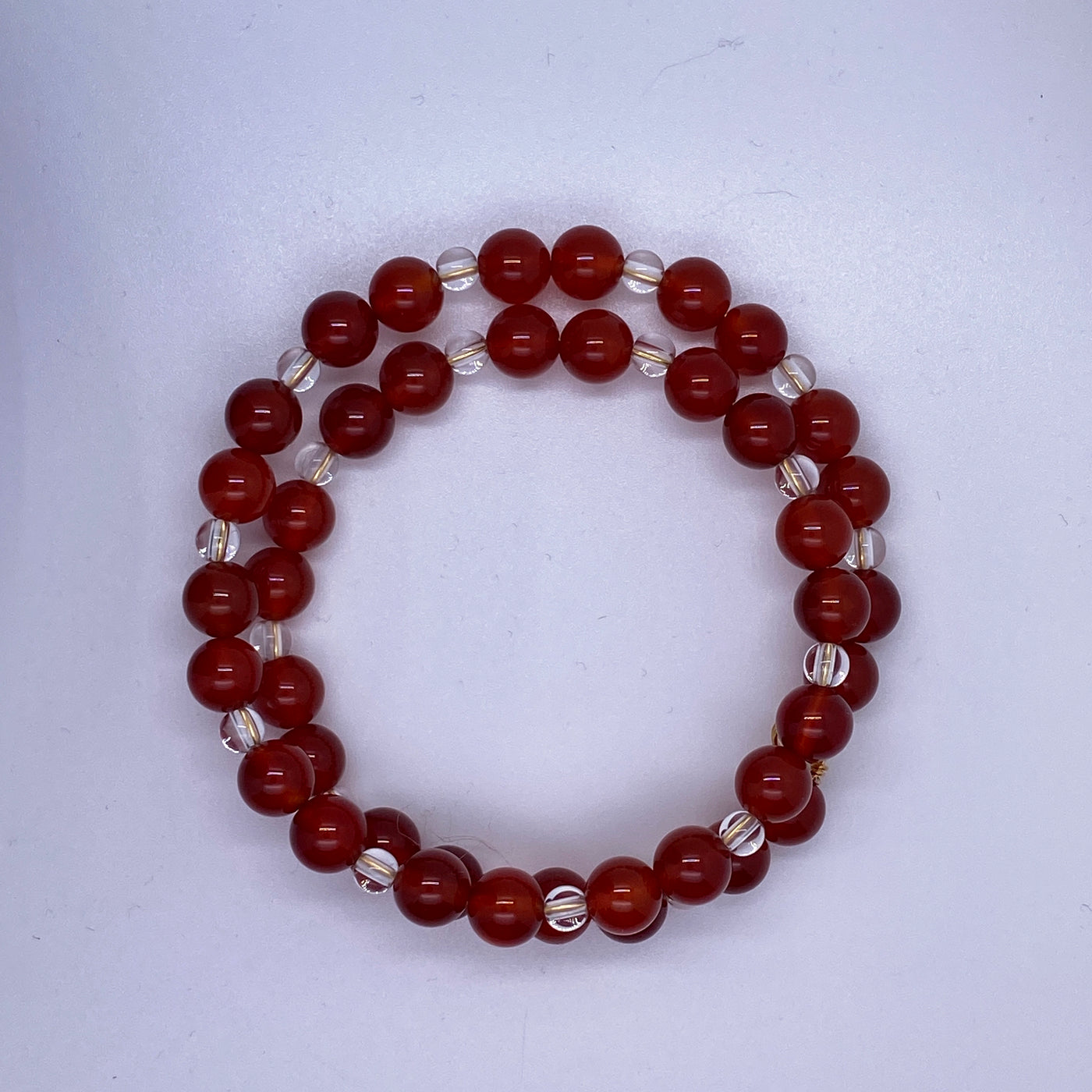 Red agate and white quartz medium pearls bracelet.