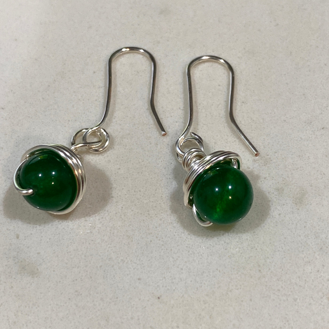 Silver wrapped green calchedony earrings