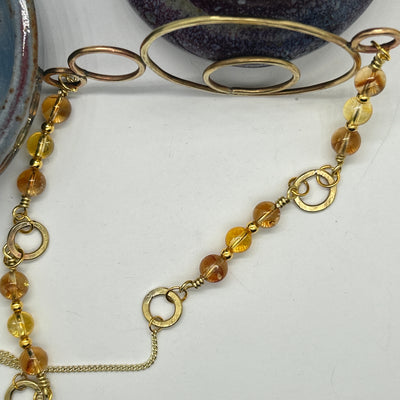 Brass and citrine oval statement necklace.  necklace lenght is 65 cm