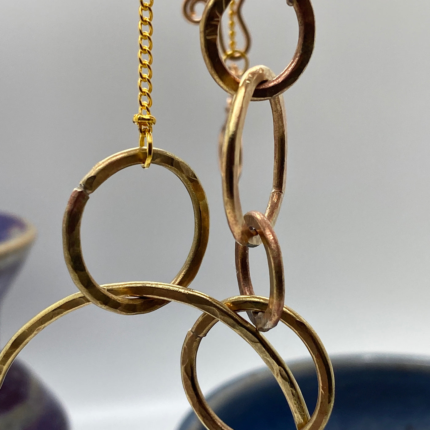 Brass circle texturized necklace on chain with golden glass beads