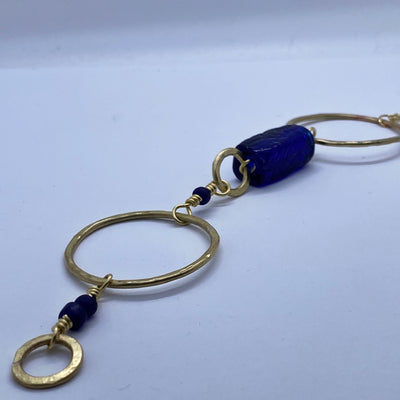 Brass hammered circles with blue glasses necklace