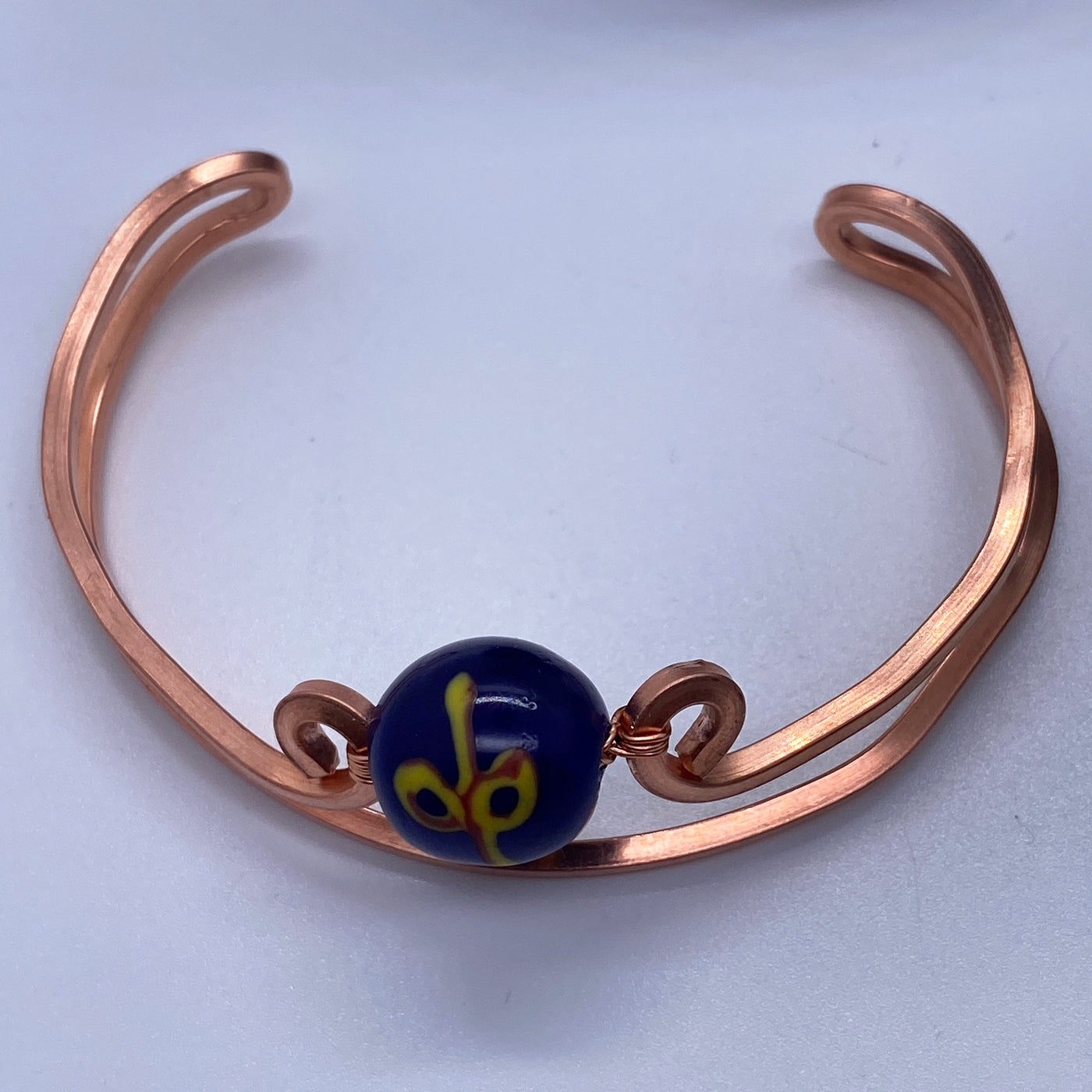 Bronze brass adjustable bracelet with hand inlaid java bead