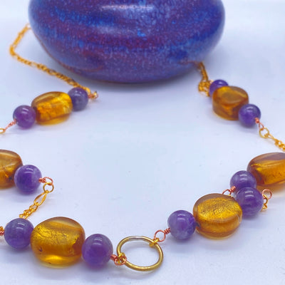 Golden glass beads and amethysts necklace