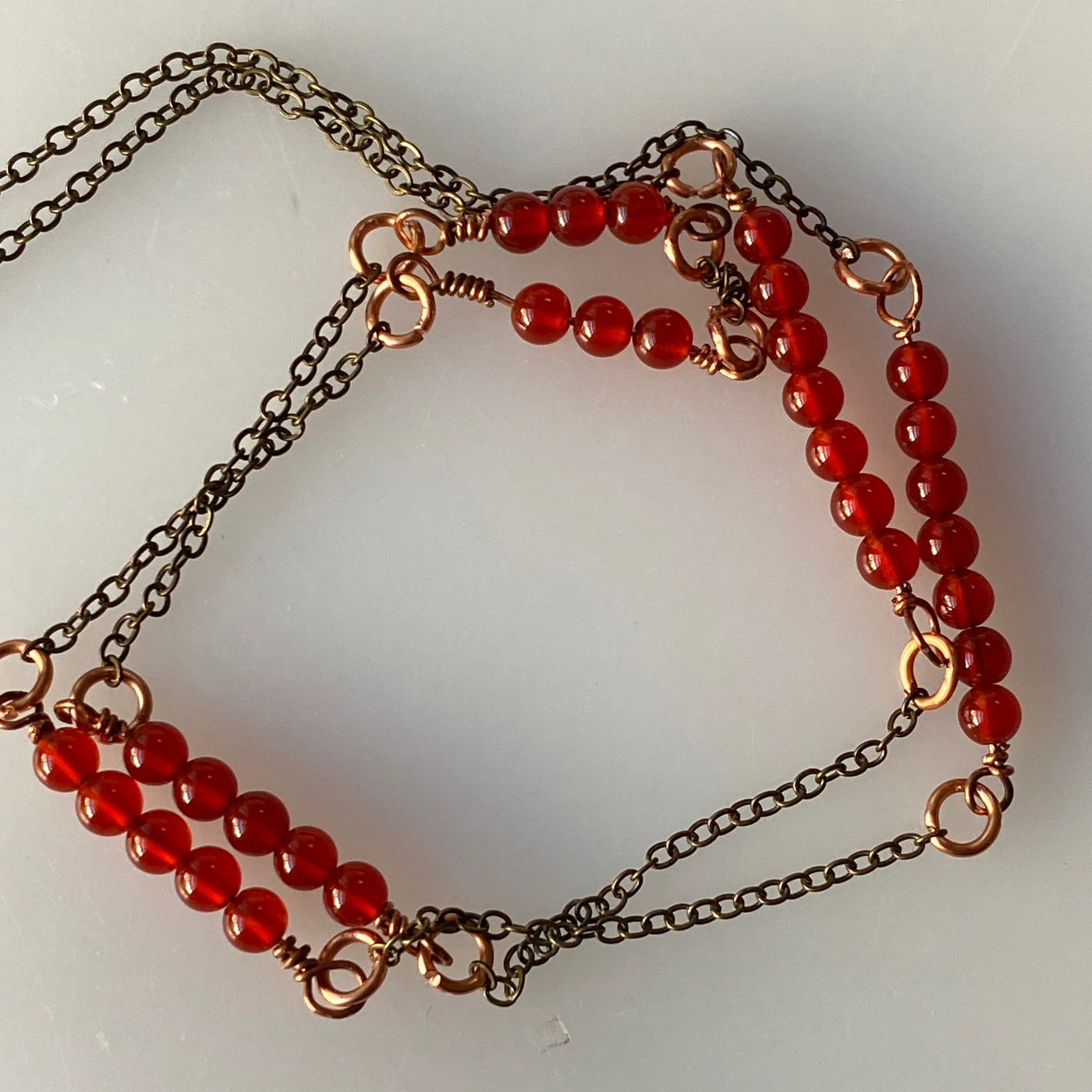 Carnelian on copper chain necklace. Lines collection for this long gorgeous necklace.