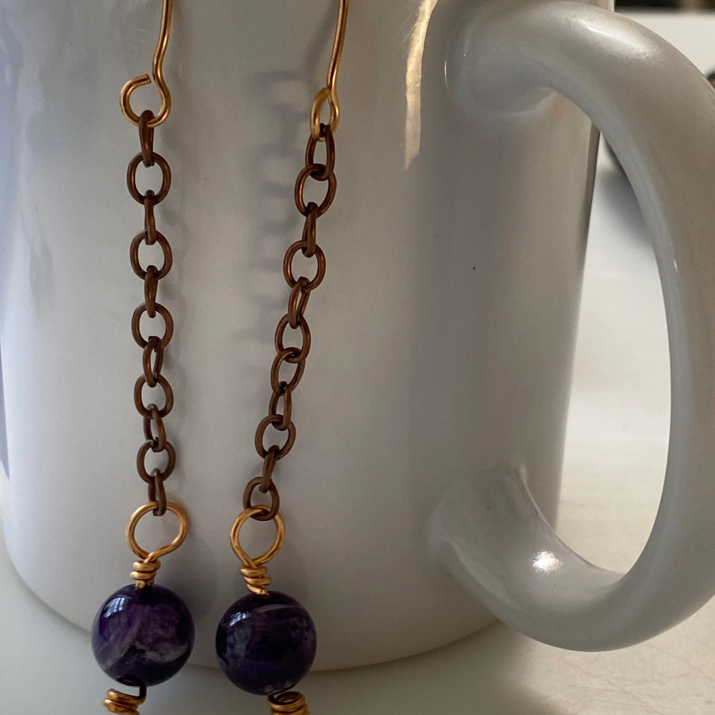 Amethysts and wire. Shake and move earrings.