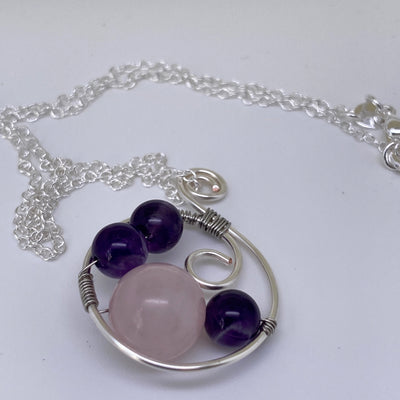 Small silver pendant with amethysts and rose quartz
