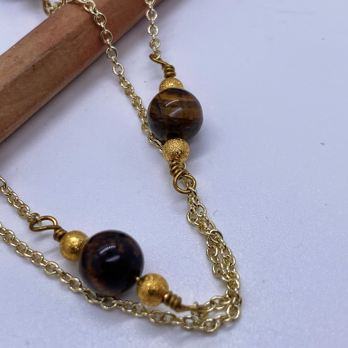 Tiger eye pearls and brass necklace