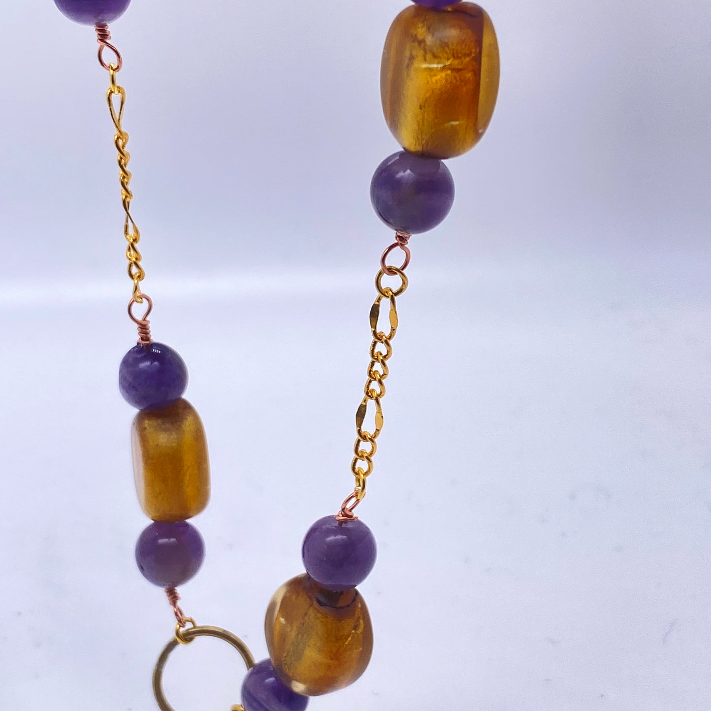 Golden glass beads and amethysts necklace