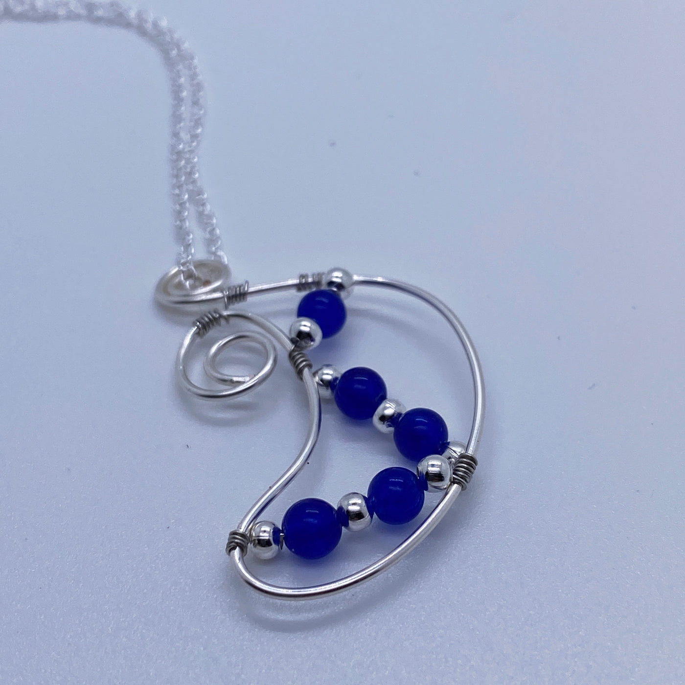 Blue calcedony agate and silver pendant.