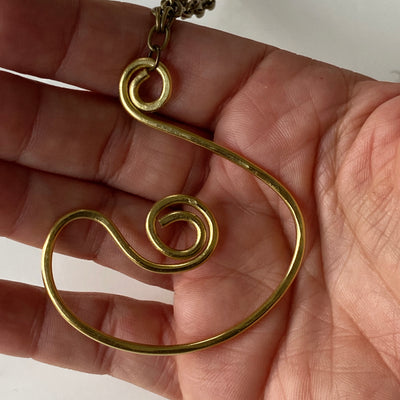 Medium simple brass pendant. Light hammered texture