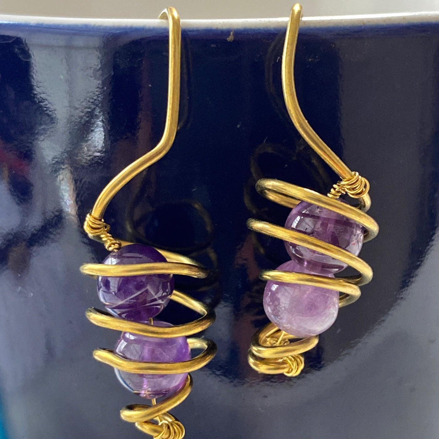 Amethyst wrapped in wire earrings. Shake and Move collection.