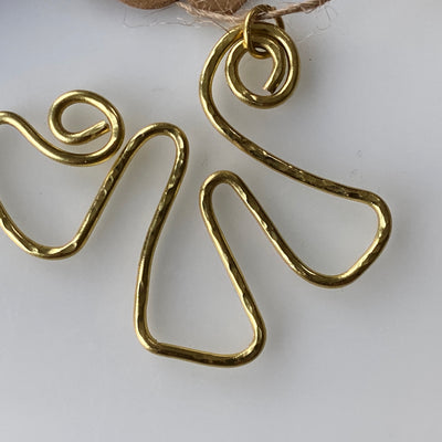 Medium size pendant. Brass. Hammered texture.