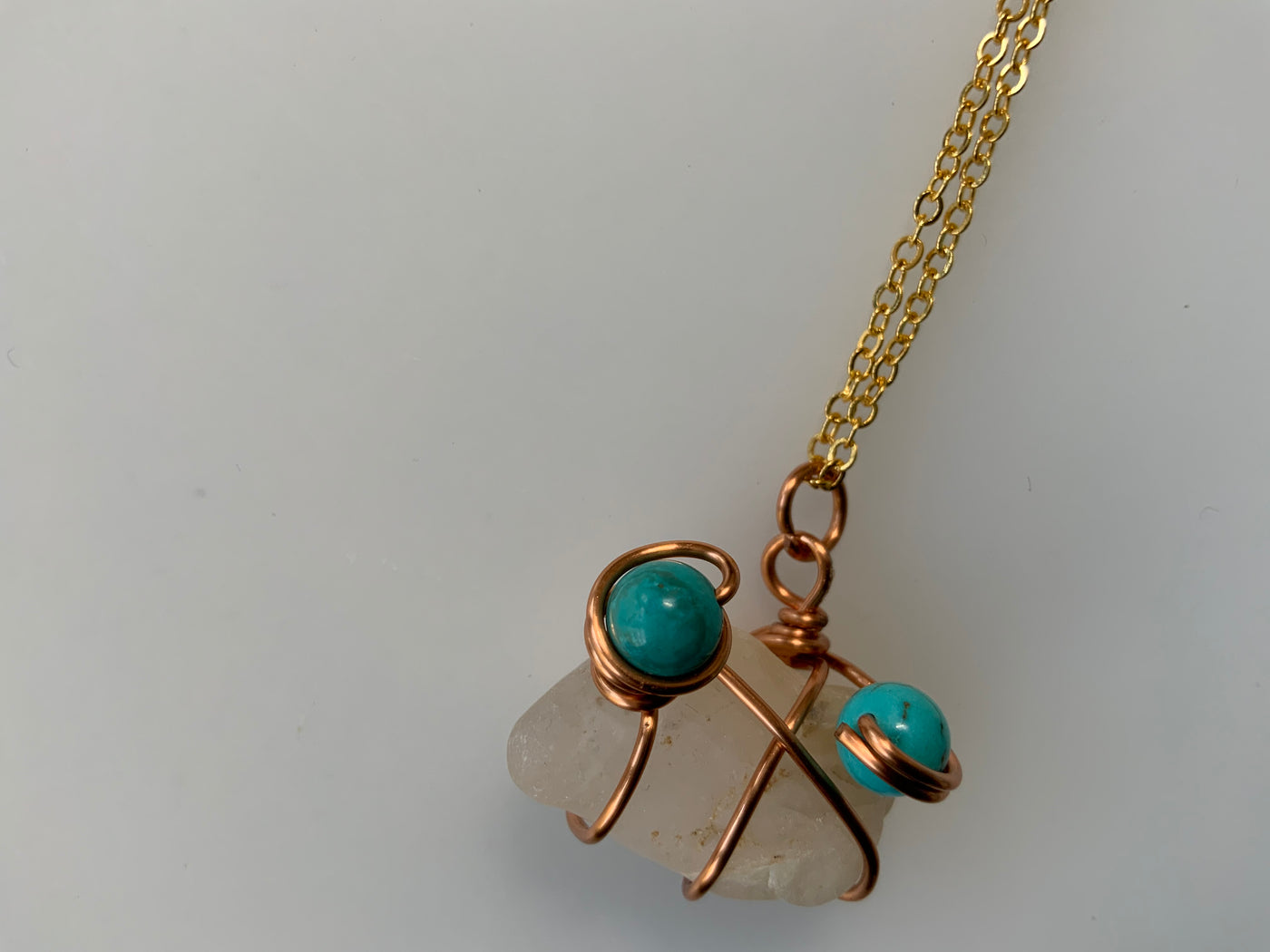 White natural stone and turquoise pendant